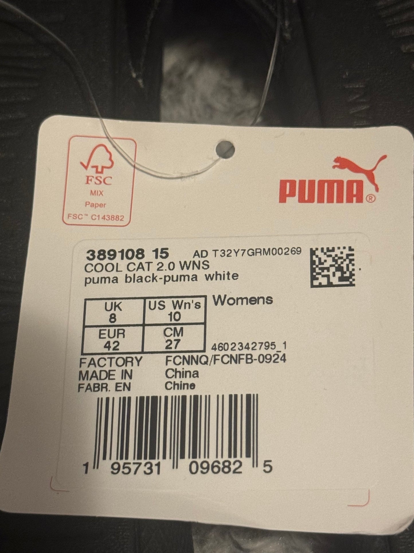Puma product tag with size chart and branding
