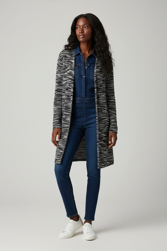A long-sleeve open-front cardigan with a black and white wavy stripe pattern, displayed against a light gray background.