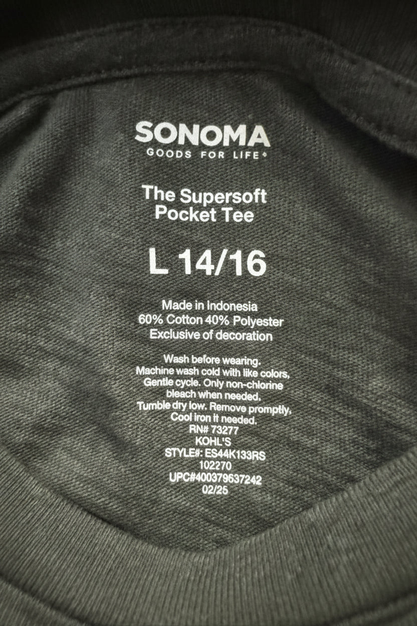 Close-up of the inner neck label of a dark gray Sonoma pocket tee, showing size L 14/16 and product details.