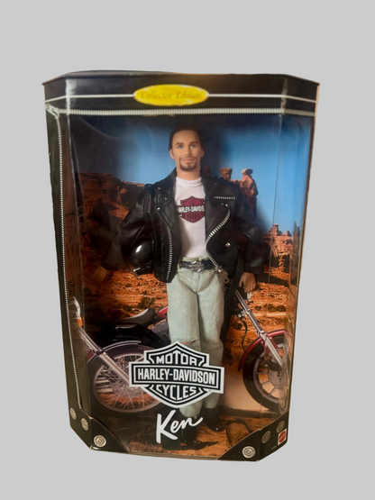 A Ken Hardee action figure of a man on a Harley-Davidson motorcycle, packaged in a clear plastic display box with a printed black, white, and blue front panel.