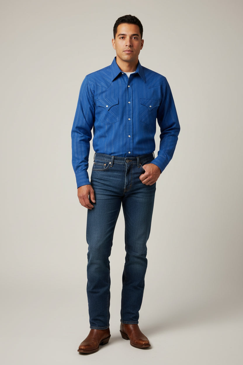 A blue long-sleeve western-style button-up shirt with thin white vertical pinstripes, laid flat on a white wooden table. The shirt has two buttoned chest pockets and is shown hanging on a black hanger