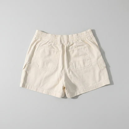 White shorts on a gray background