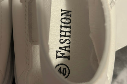 White shoe with 'FASHION' and a logo on the sole