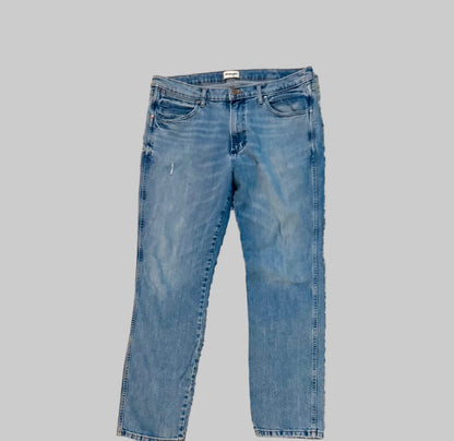 Pair of blue jeans on a gray background