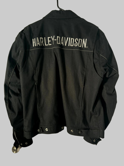 Black Harley-Davidson jacket hanging on a door