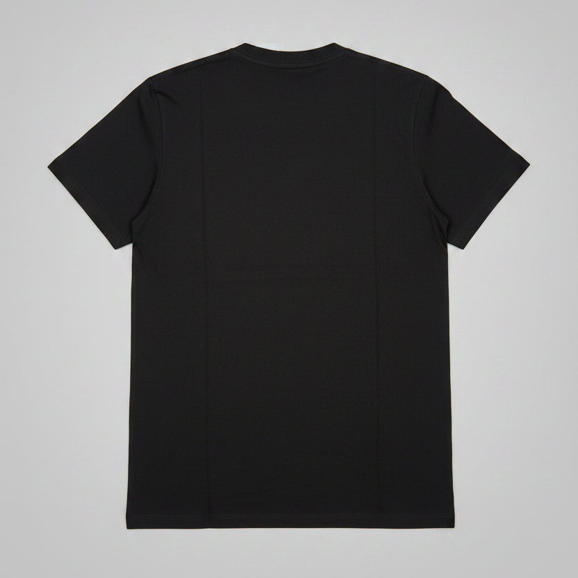 Black t-shirt on a wooden surface