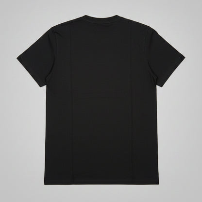 Black t-shirt on a wooden surface