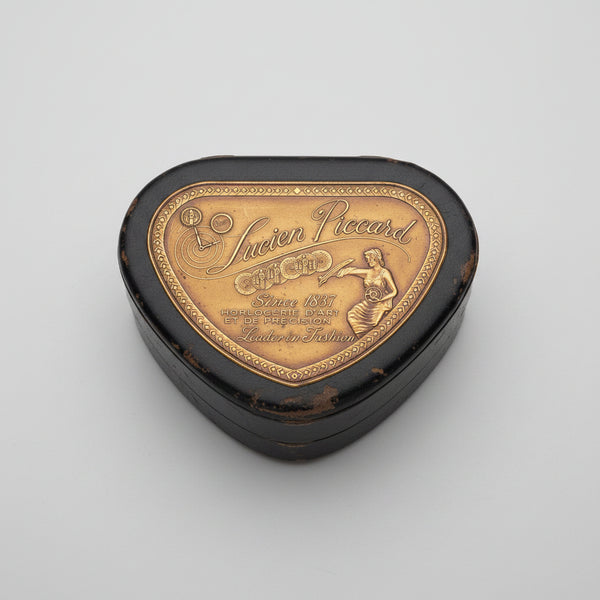 Heart-shaped Suivien Piccard watch box on a white background
