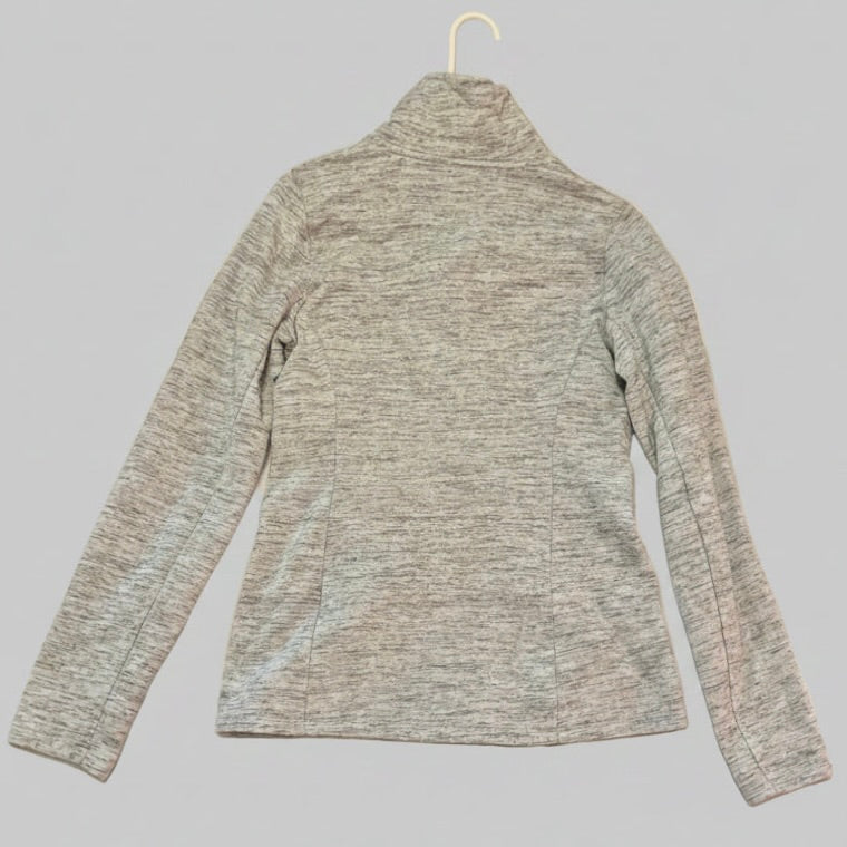 Gray long-sleeve shirt on a hanger against a gray background