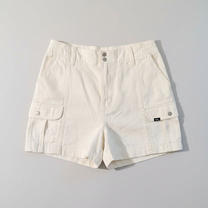 White shorts on a gray background.
