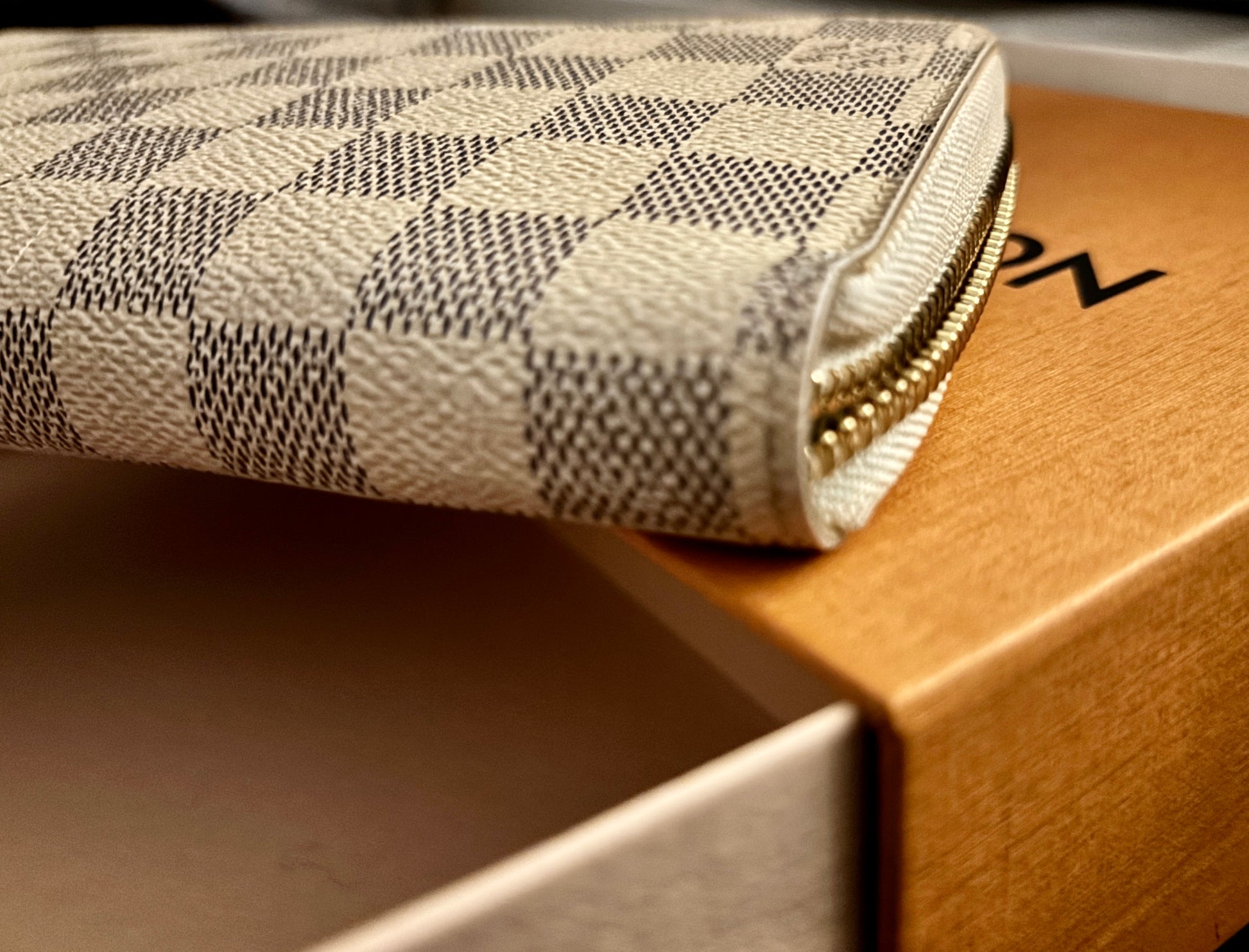 Patterned wallet on a cardboard box