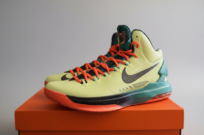 Colorful sneaker with a prominent Nike logo on an orange box.