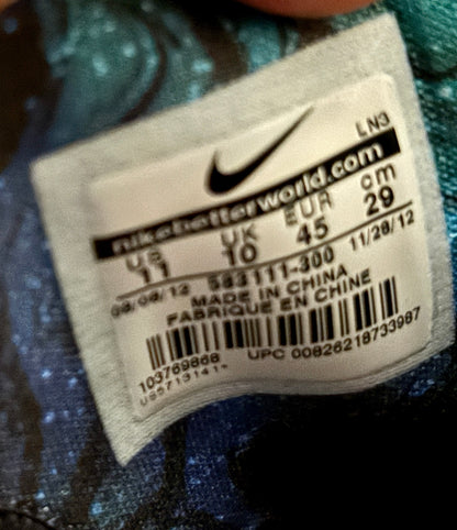 Close-up of a Nike tag on a shoe with size and brand information.