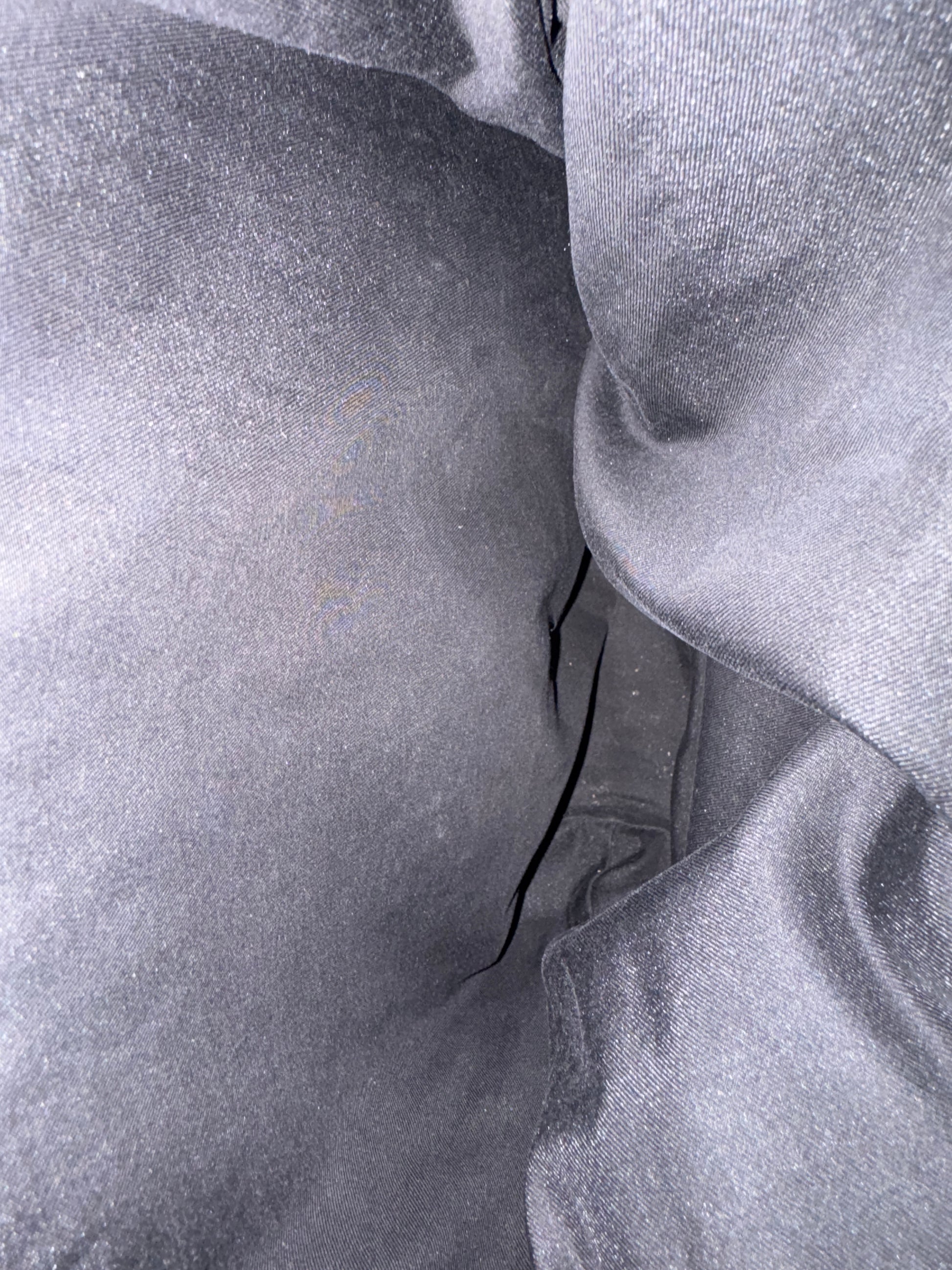 Close-up of textured gray fabric with folds