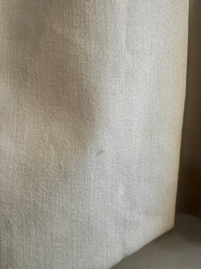 Close-up of beige fabric with a slight texture