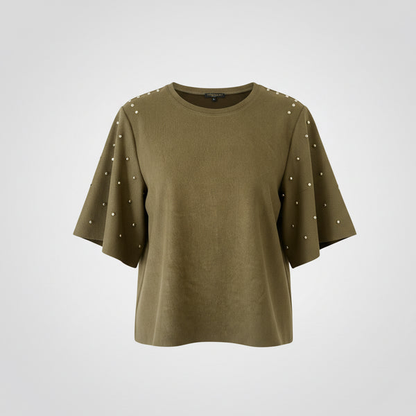 Olive green t-shirt with decorative studs on a light gray background