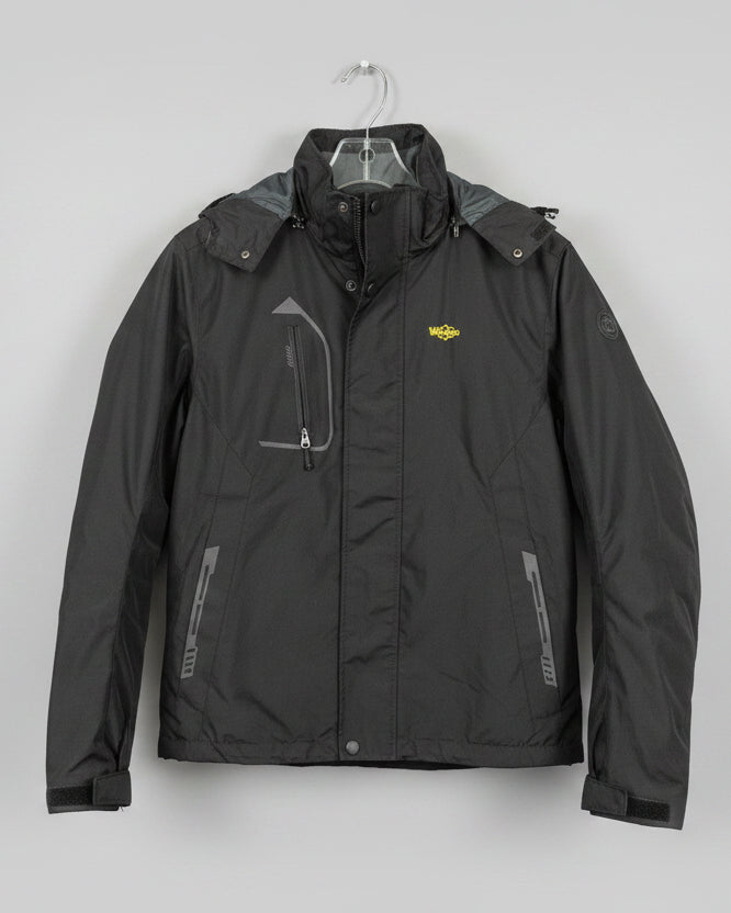 A black zip-up jacket with a small yellow embroidered 'Wiggles' logo on the chest, hanging on a rack in a retail store.