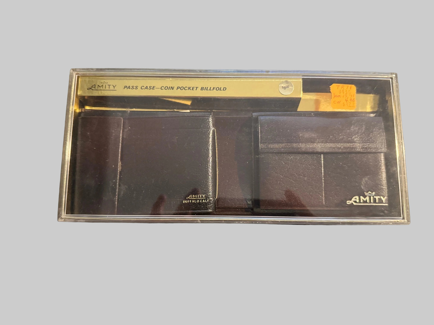 Amity wallet set in packaging on a textured surface