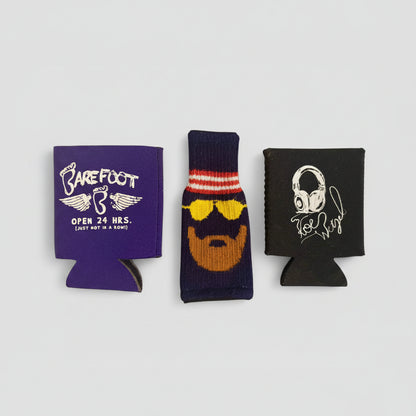 Three can coolers with different designs on a white background