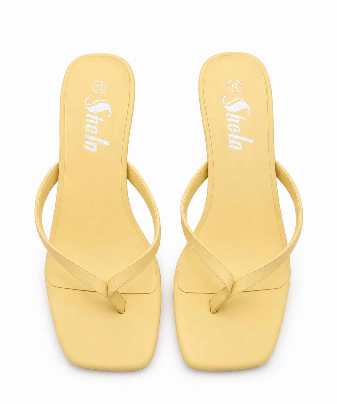 A pair of pale yellow flat thong sandals with square toes and a low block heel, shown from a top-down view on a white background. The brand name 'Shehn' is printed in white on the insole.